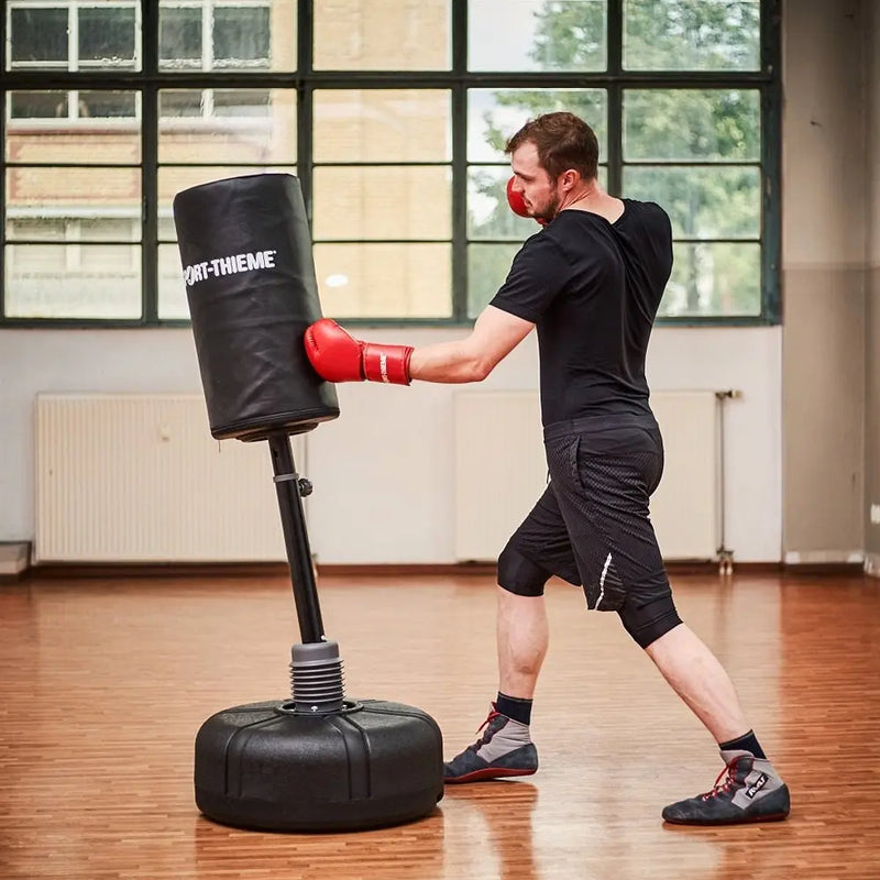 Standing punching bag adjustable height
